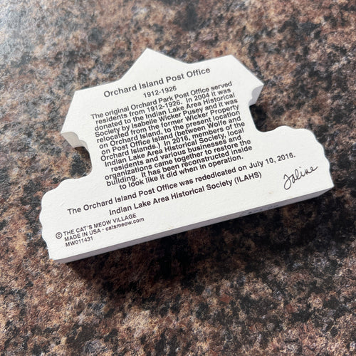 White back with info on a stone surface