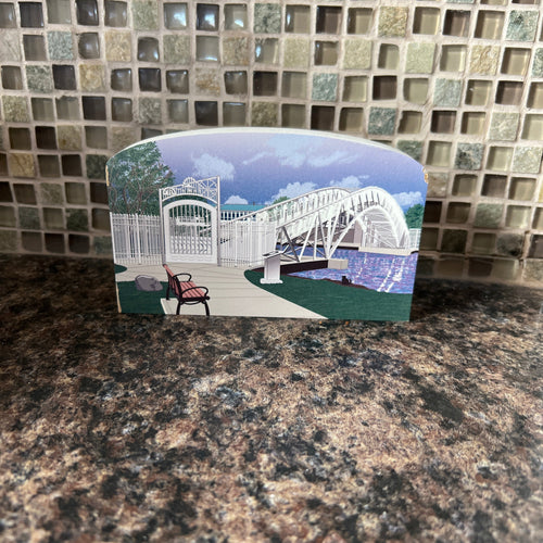 Small rectangular object with a printed design on a textured surface