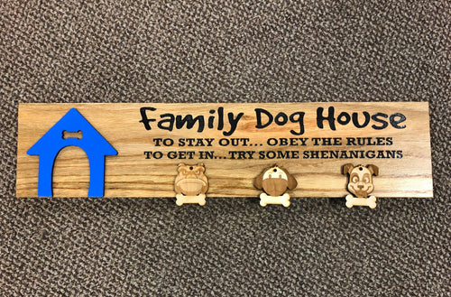 in this house wooden sign