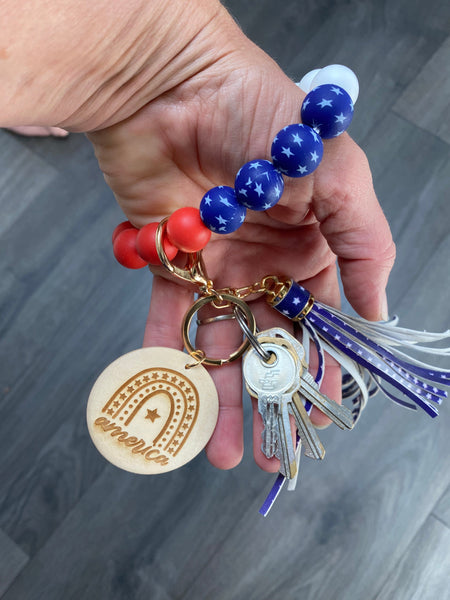 Patriotic USA SILICONE Wristlet Keychain. American Stretchy Bangle Wristlet with Engraved Pendant. Bangle Key Ring. Gift for Her. - C & A Engraving and Gifts