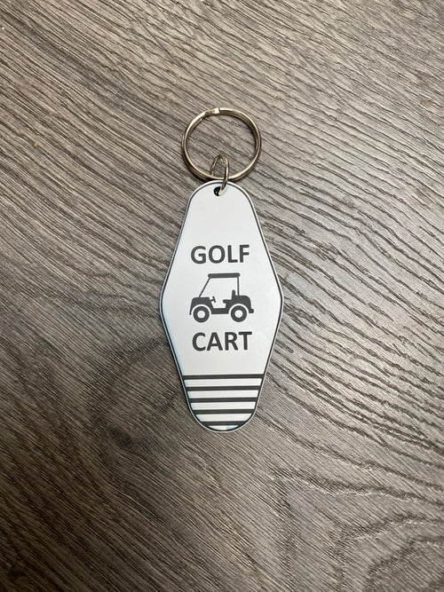 white and black engraved golf cart key chain